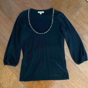 Burberry 3/4 sleeve shirt with checkered collar.